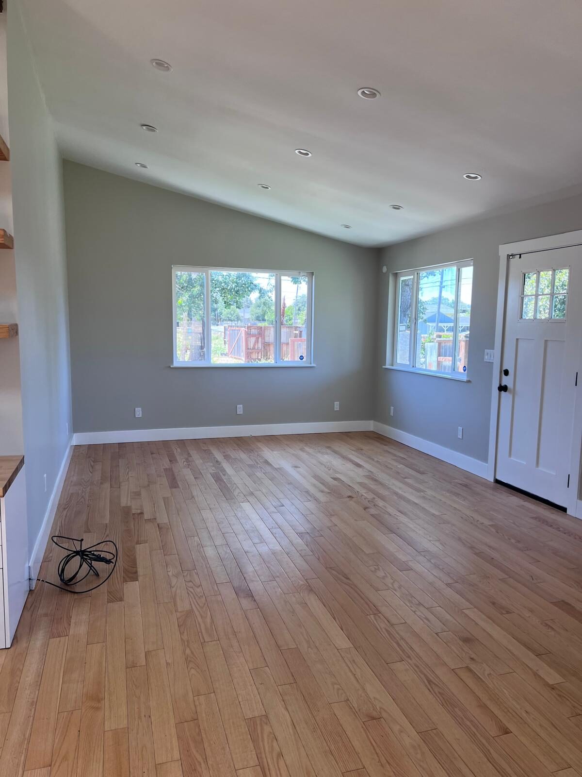 Home A — bright living room with hardwood floors