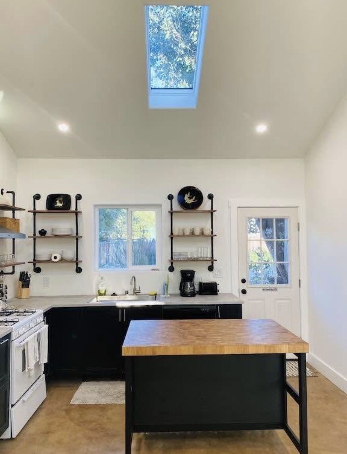 Studio C — kitchen with skylight and gas range