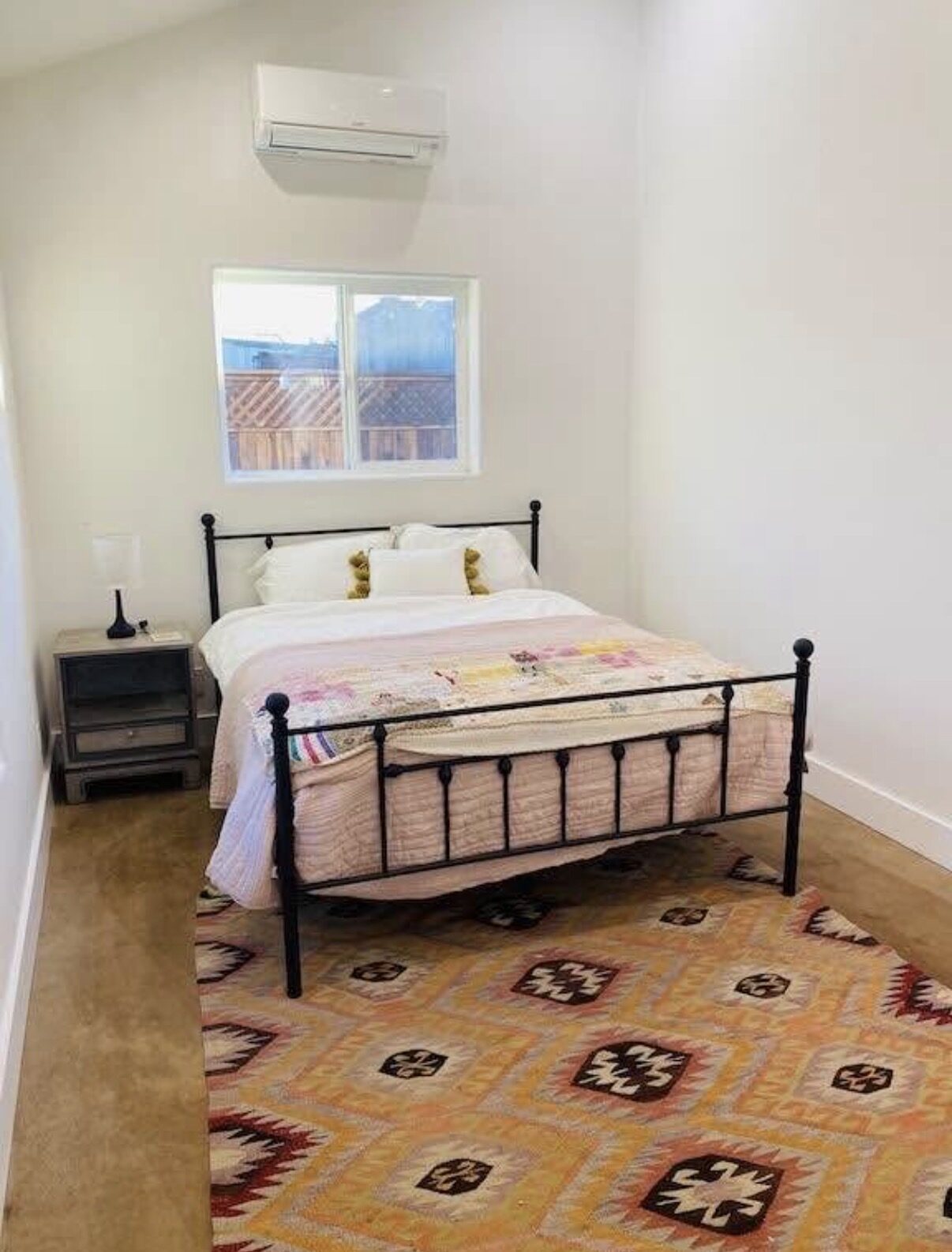 Studio C — bedroom with mini-split heating and cooling